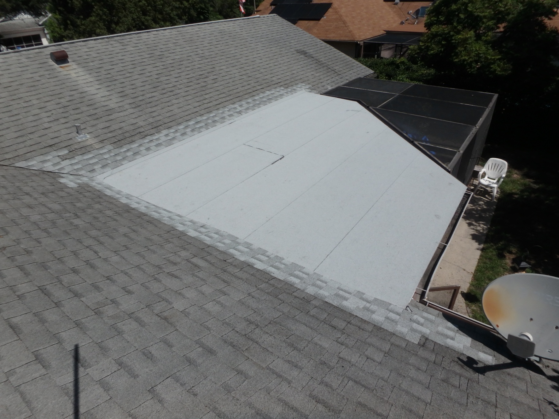 Failing Flat Section → New Modified Bitumen Membrane after